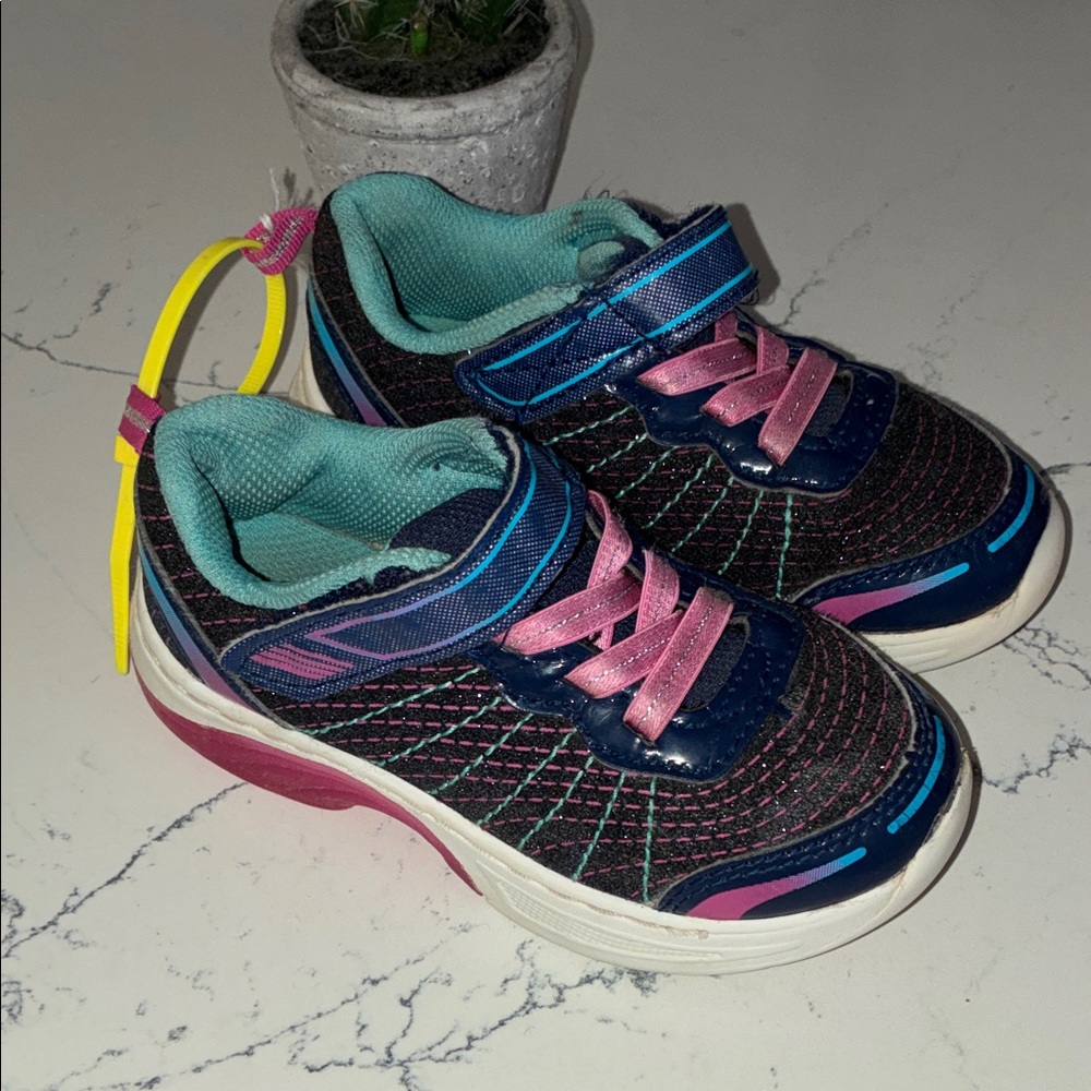Colorful Kids Sneakers with Pink and Blue Accents running